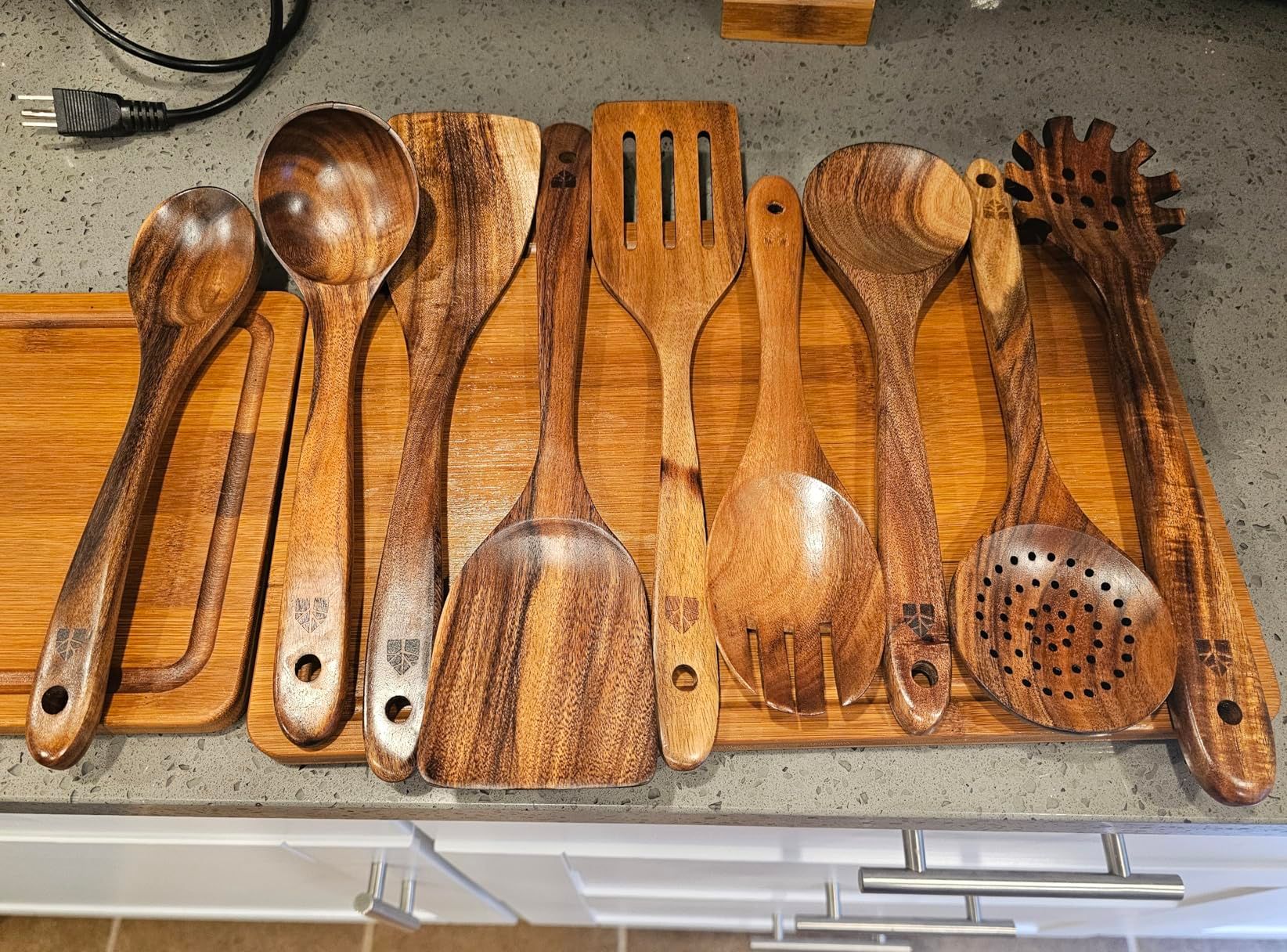 Acacia Wood Kitchenware Material and Finish Detail Acacia wood kitchen utensils showing grain and surface finish for wooden kitchenware buyers